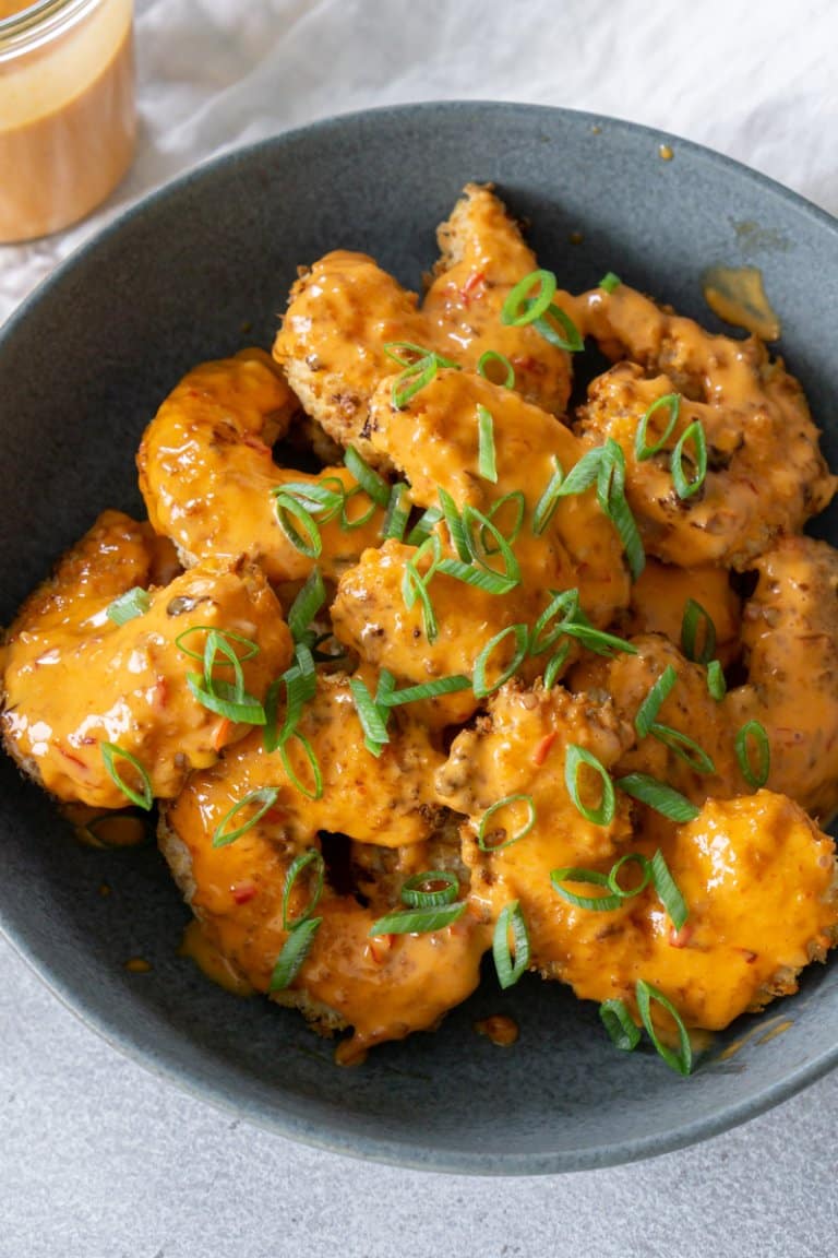 close up of bang bang shrimp in a bowl