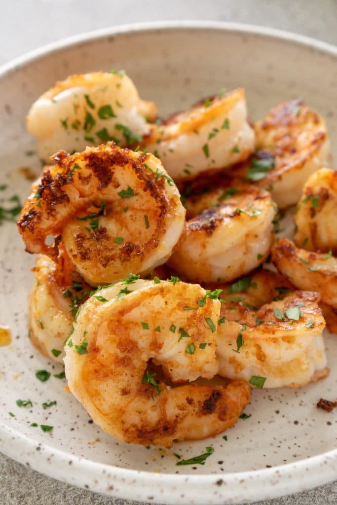 cooked shrimp on a white plate