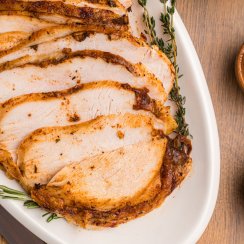 sliced air fryer turkey breast on a plate