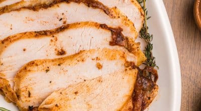 sliced air fryer turkey breast on a plate