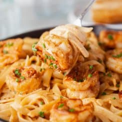 a bite of bang bang shrimp pasta on a fork