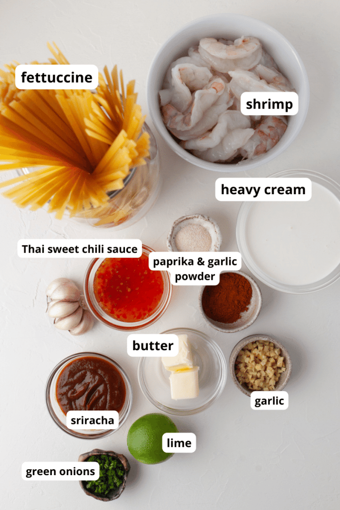 spaghetti, shrimp, sriracha, lime, garlic, and paprika in small bowls