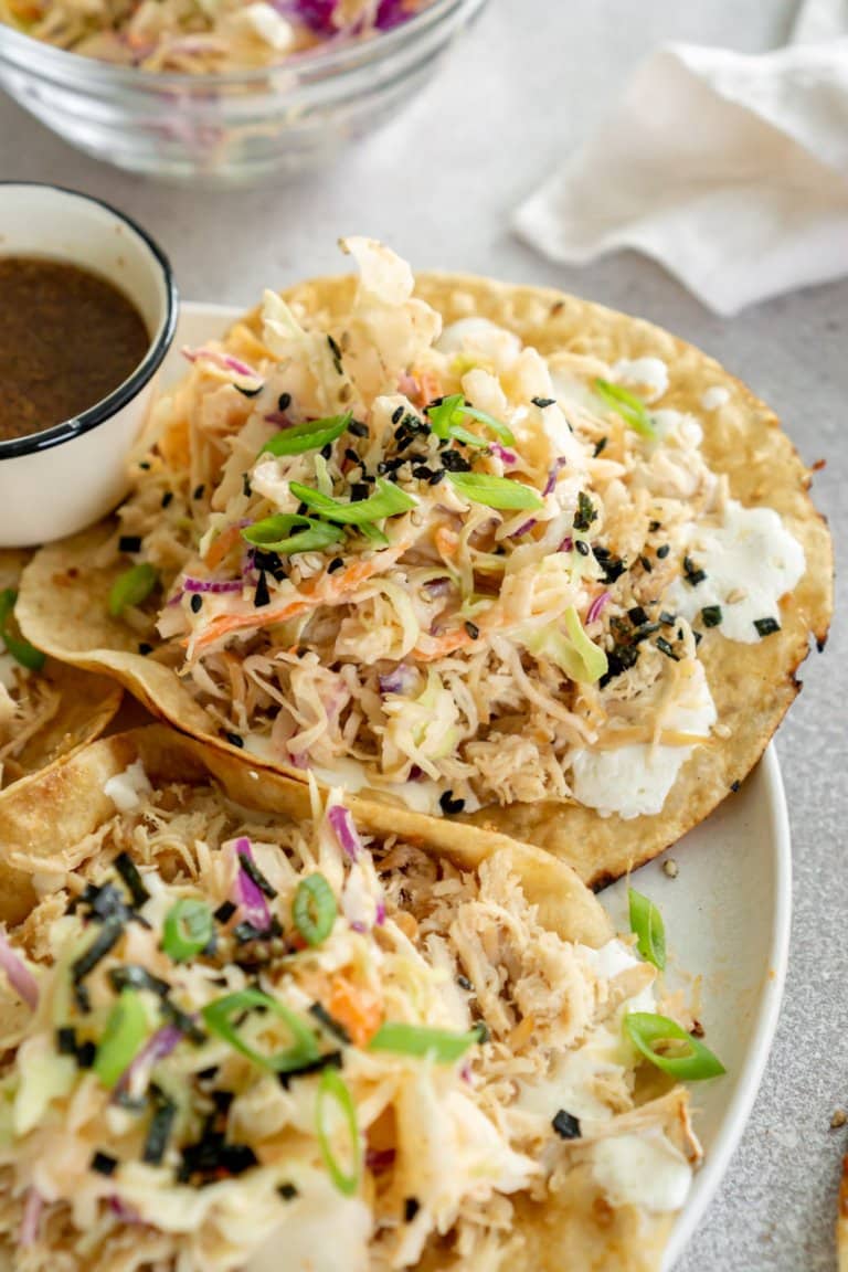 two trader joe's soyaki tacos on a white plate