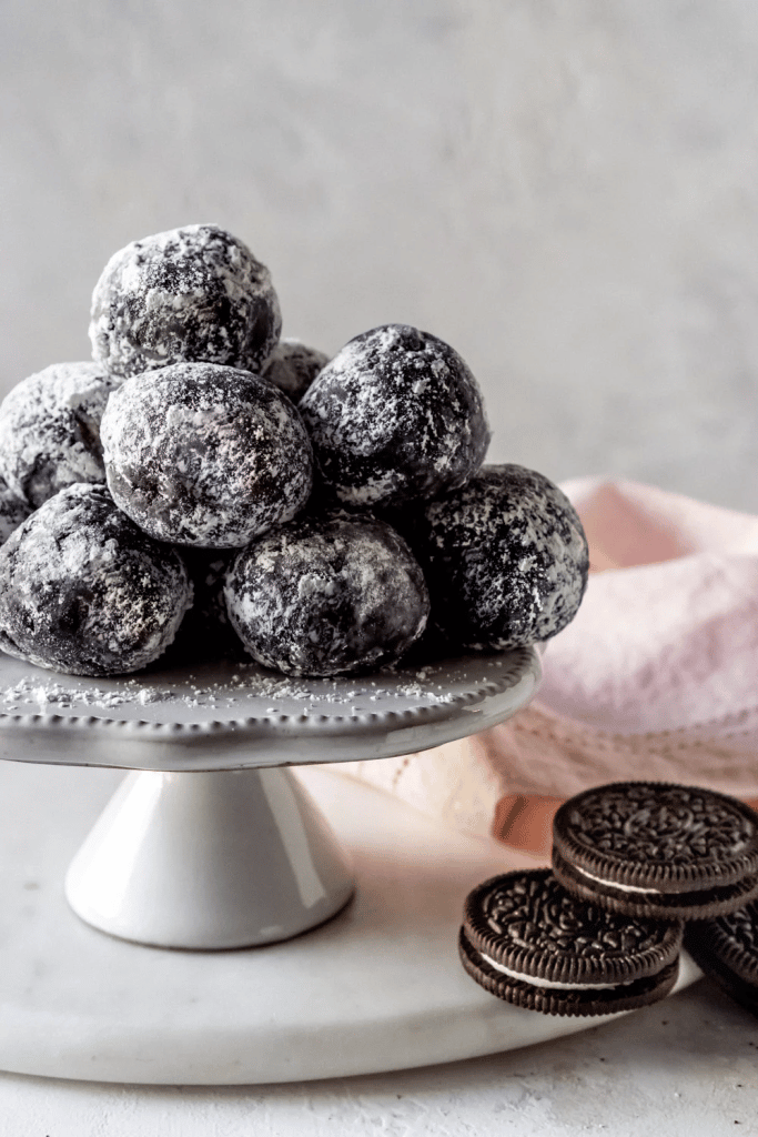 Oreo cookie balls on white platter