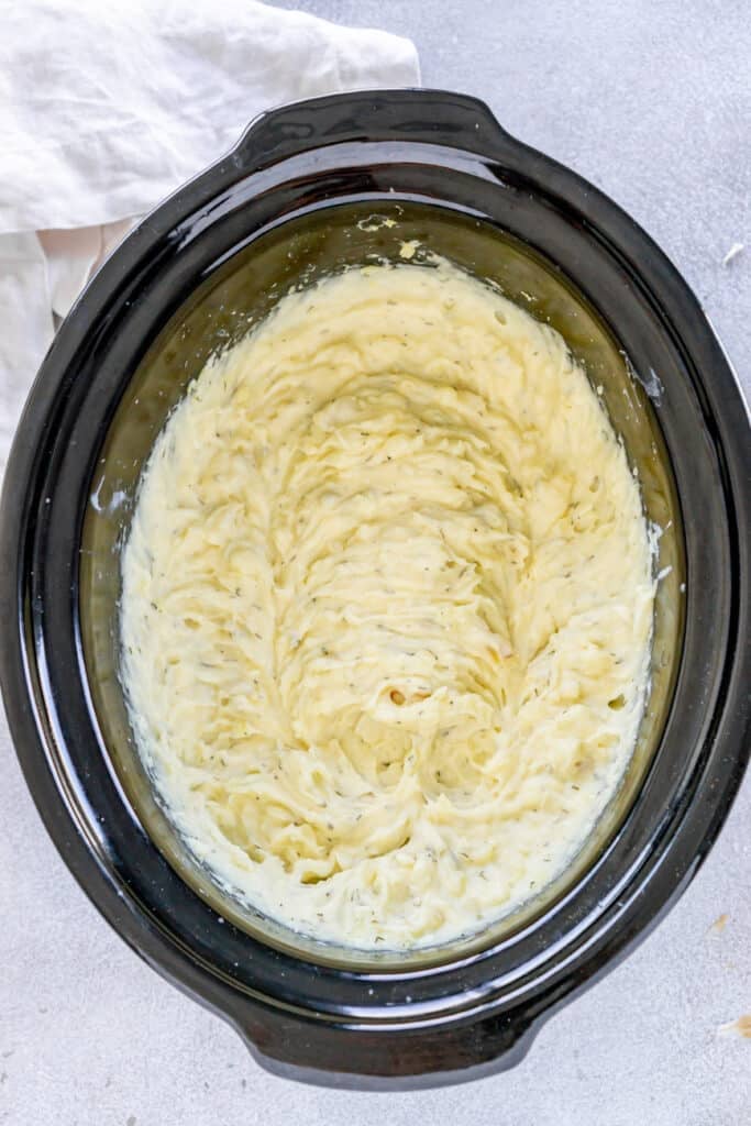 Mashed potatoes in a slow cooker.