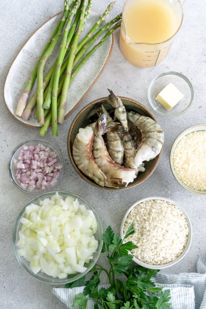 shrimp, asparagus, onion, shallot, broth, arborio rice, and parsley
