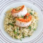 shrimp asparagus risotto in a white bowl