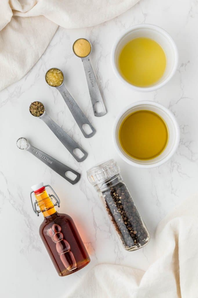 lemon juice, herbs, vinegar, black pepper, and olive oil in small ingredient bowls and measuring spoons