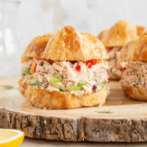 salmon salad sandwich on a serving tray