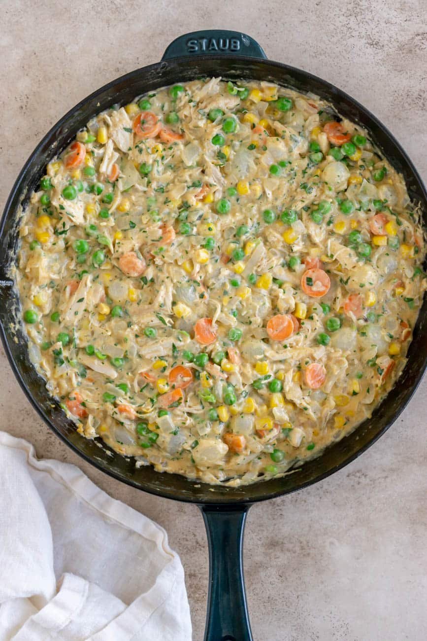 Uncooked filling in a pan for Turkey Pot Pie.