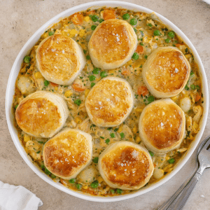 turkey pot pie with biscuits in a pie dish