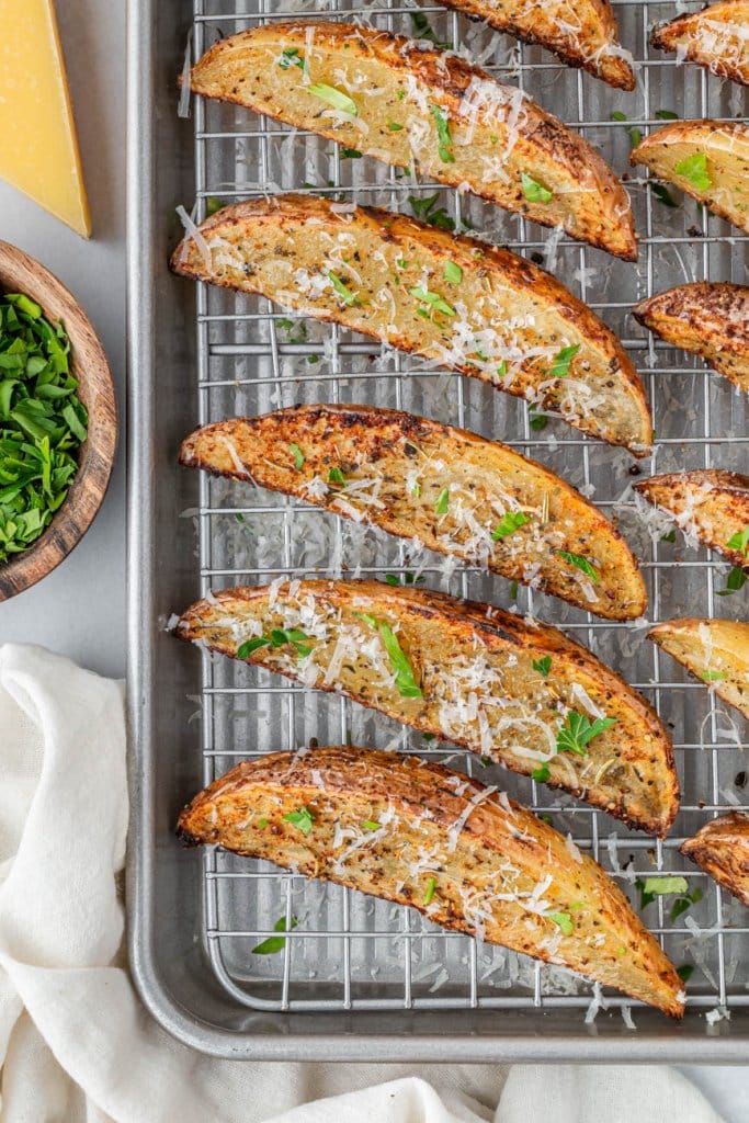 air fryer potato wedges on a cooling rack