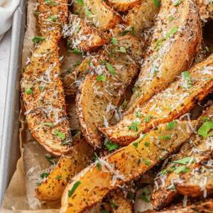 Air Fryer Potato Wedges close up on parchment paper