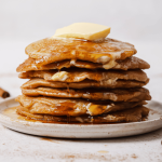 a stack of spiced apple pancakes on a plate