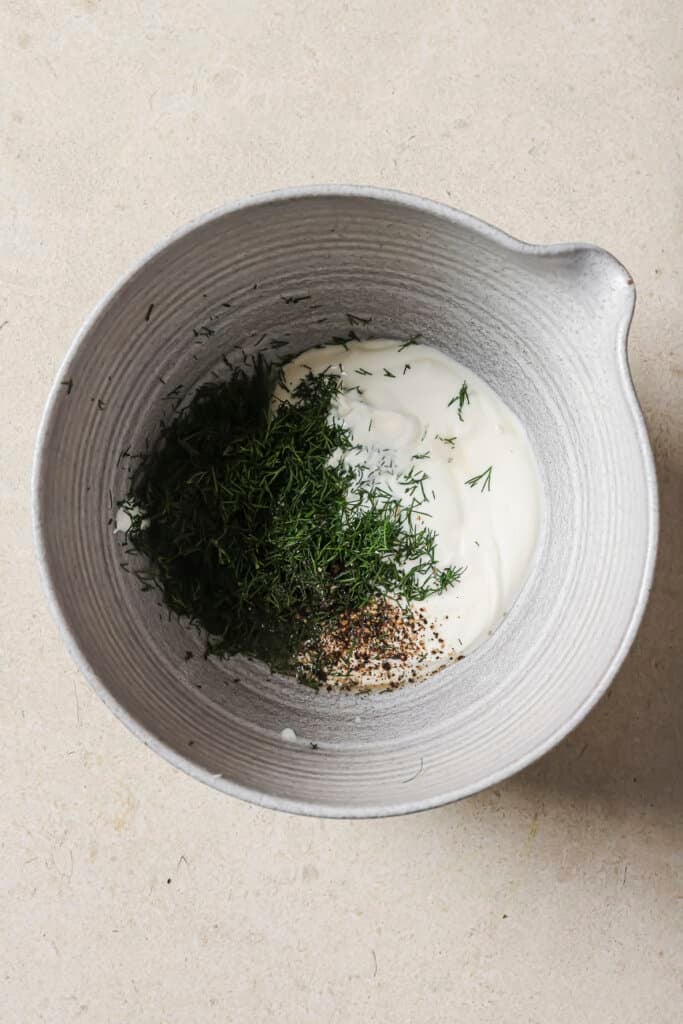 lemon dill sauce ingredients in a mixing bowl