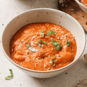 roasted vegetable soup in a white bowl