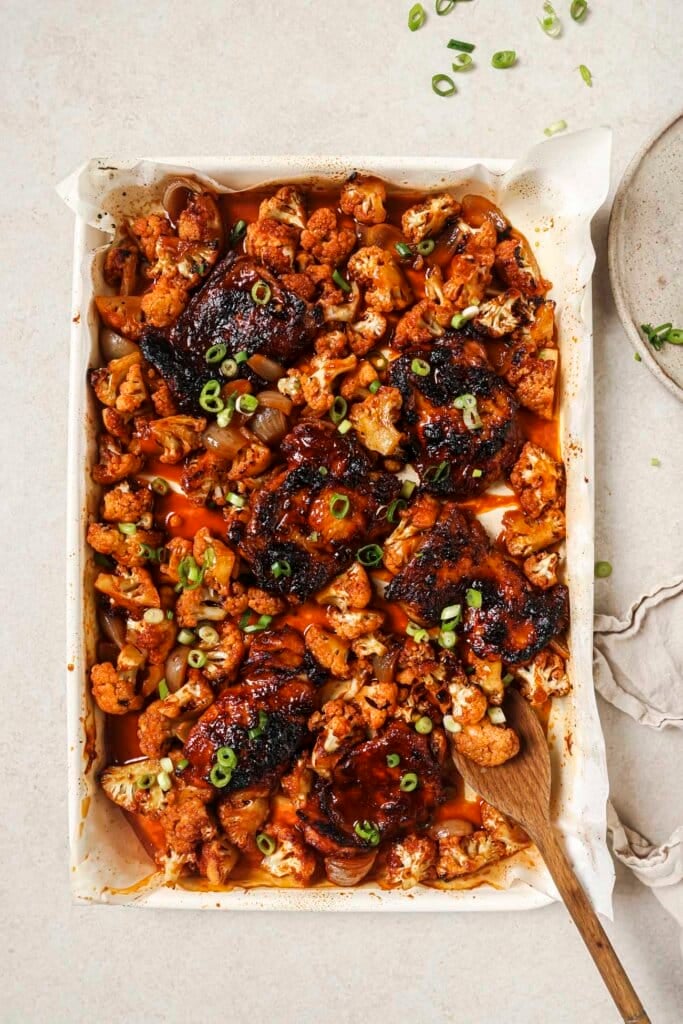 Overhead view of sheet pan gochujang chicken thighs.