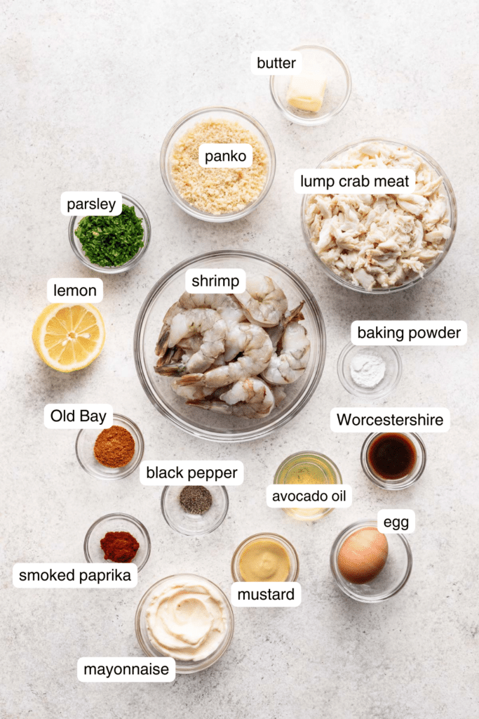 crab meat, shrimp, paprika, parsley, lemon, egg, panko, salt, and pepper in small ingredient bowls