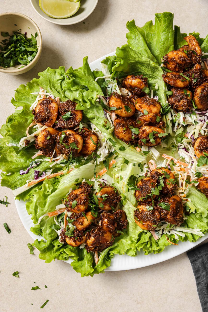 Overhead view of lettuce wraps with blackened shrimp.