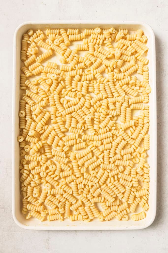 pasta on a white sheet pan