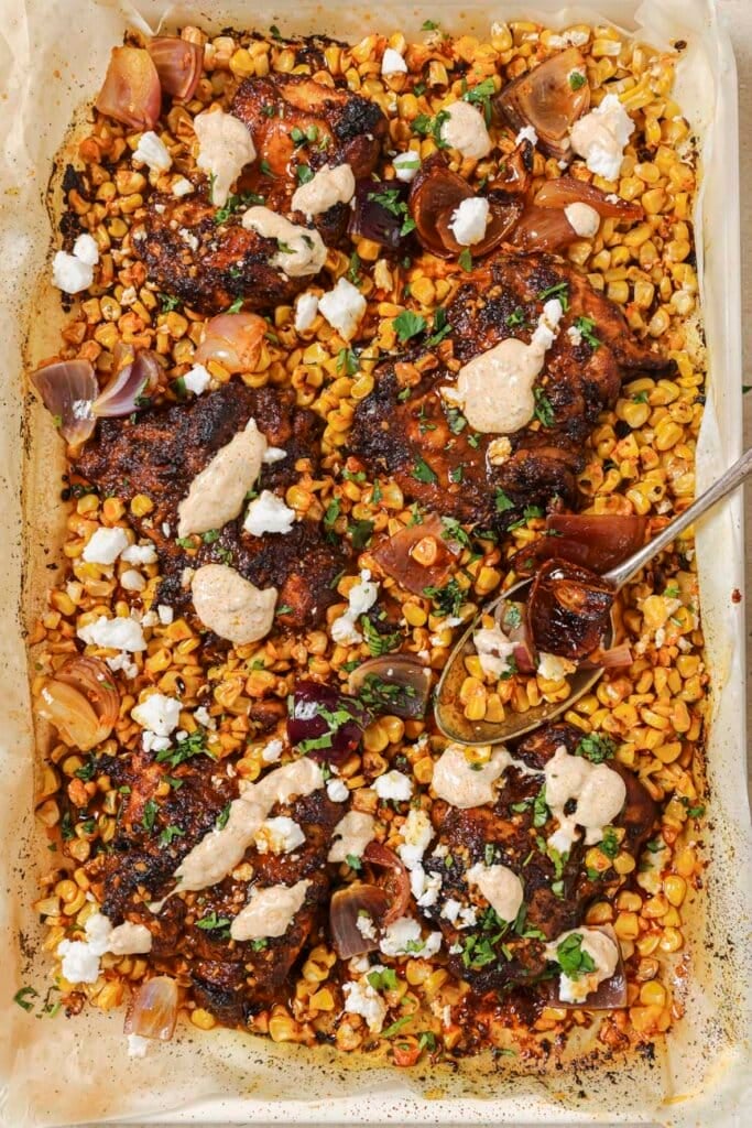 Top down view of sheet pan chicken thighs from Trader Joe's.