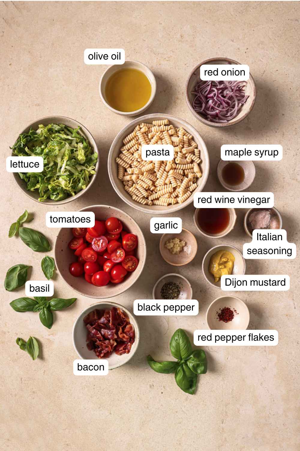 Labeled ingredients for BLT pasta salad.