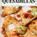 a pinterest short pin for leftover turkey quesadillas with a photo of the quesadillas with guac and salsa.