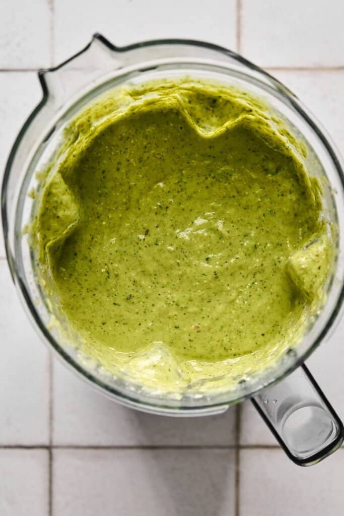 Blending together ingredients for broccoli feta soup.