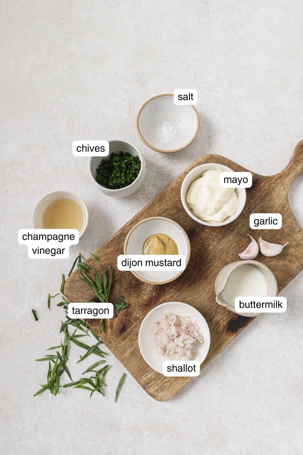 Labeled ingredients for warm potato salad dressing.