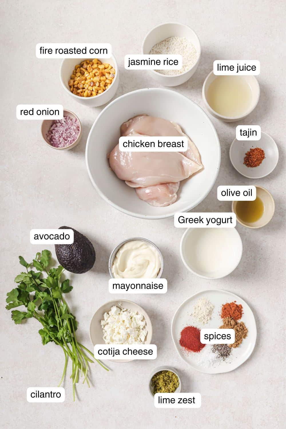 Labeled ingredients for street corn chicken rice bowl.