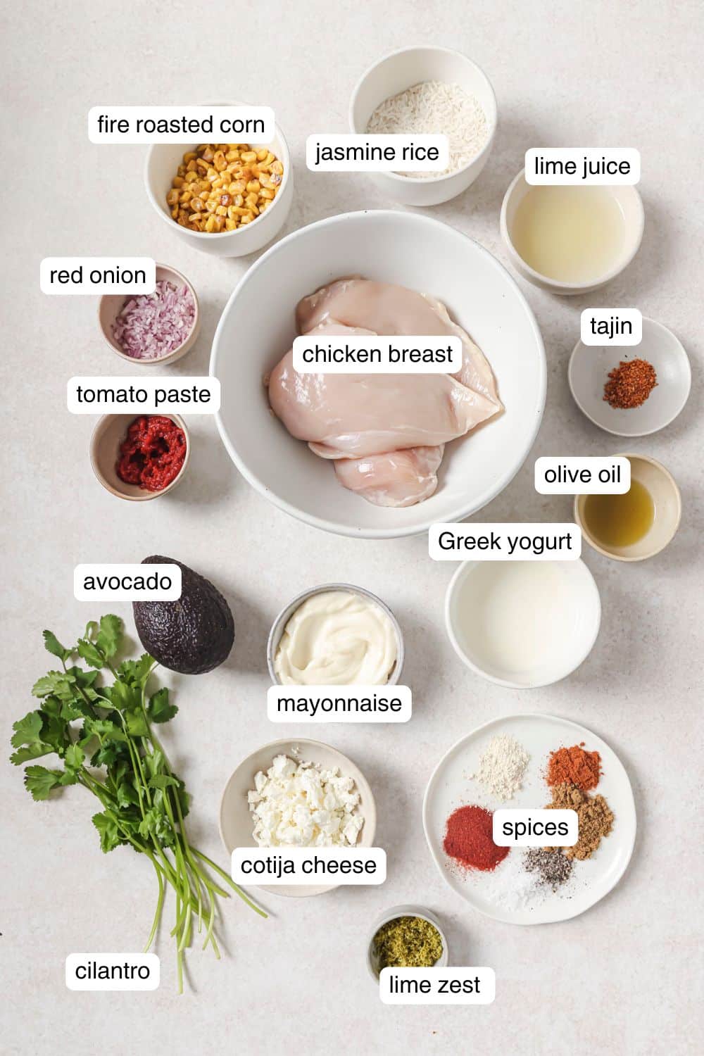Labeled ingredients for street corn chicken rice bowl.