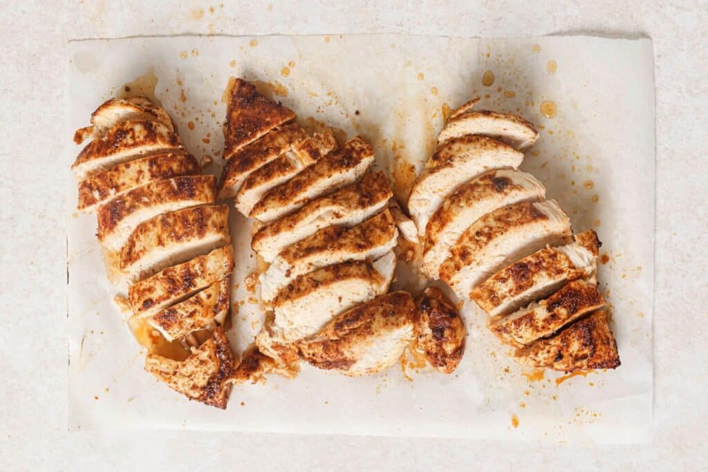 Sliced seasoned chicken breasts.