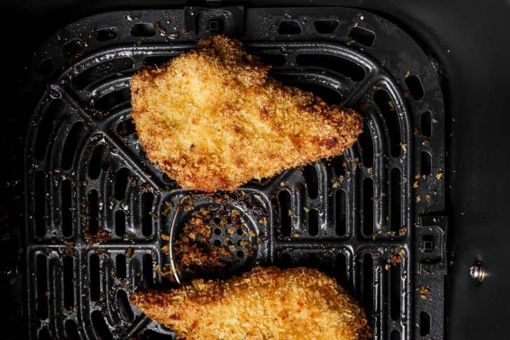 Golden brown chicken in the air fryer.