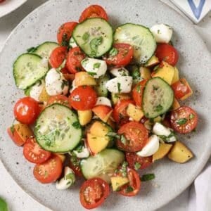 A plate of cherry tomato salad.