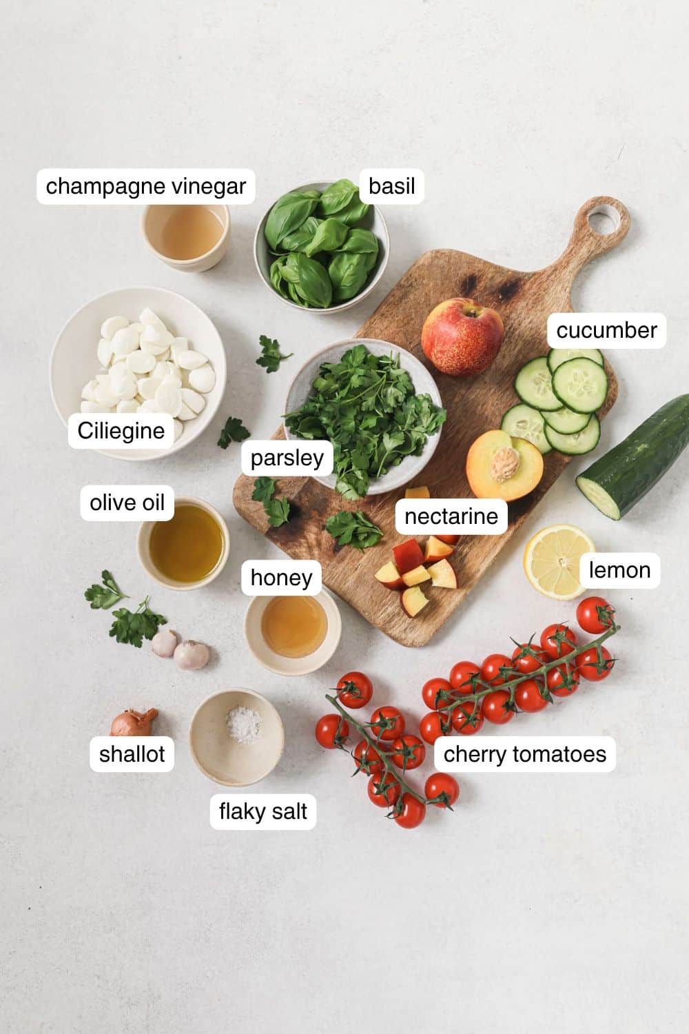 Labeled ingredients for cherry tomato salad.
