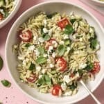 A bowl of spinach orzo pasta salad.