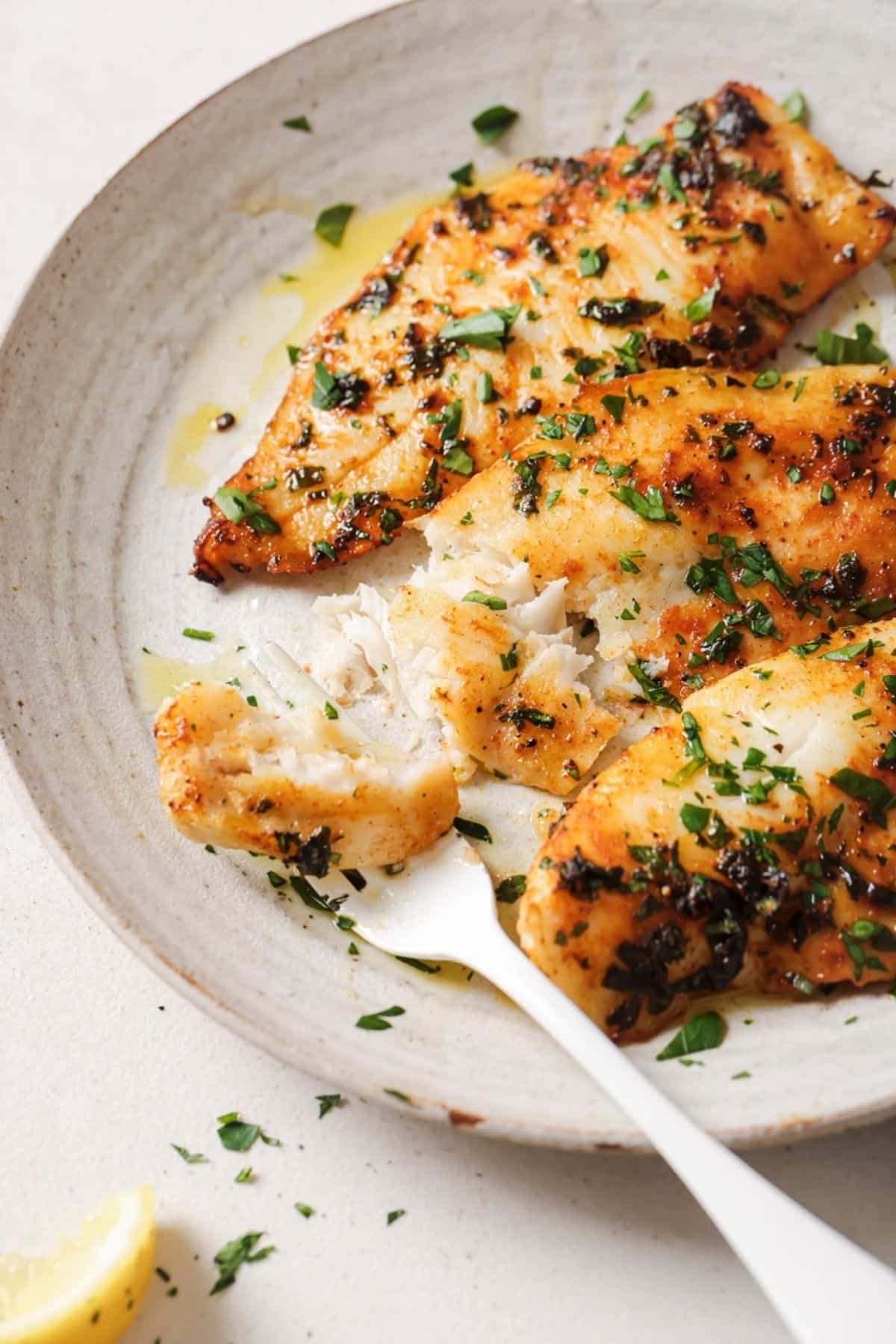 A plate of air fried tilapia.
