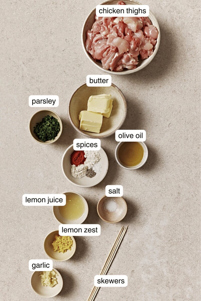chicken thighs, butter, spices, parsley, garlic, and salt in small ingredient bowls