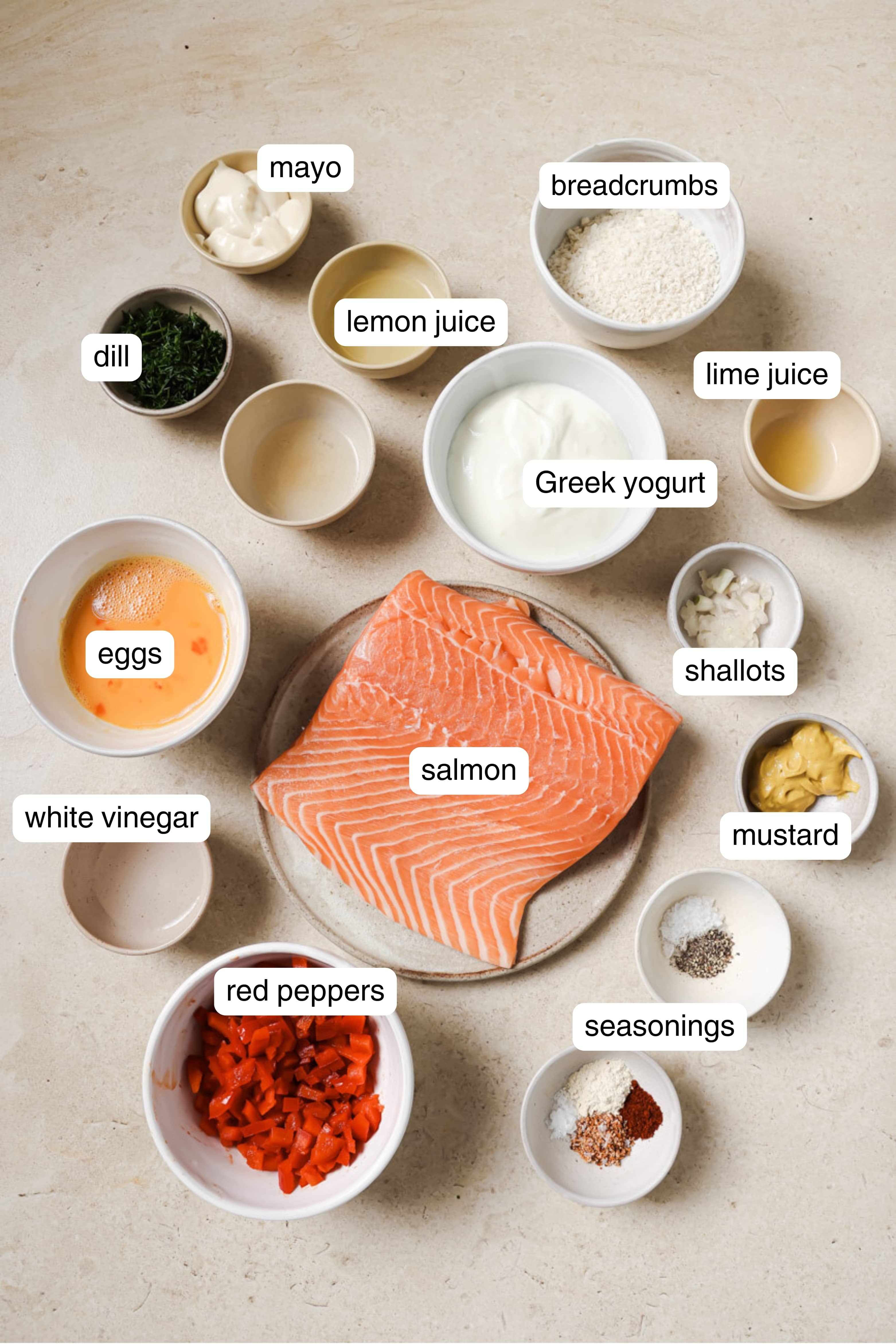 Labeled ingredients for air fryer salmon burgers.