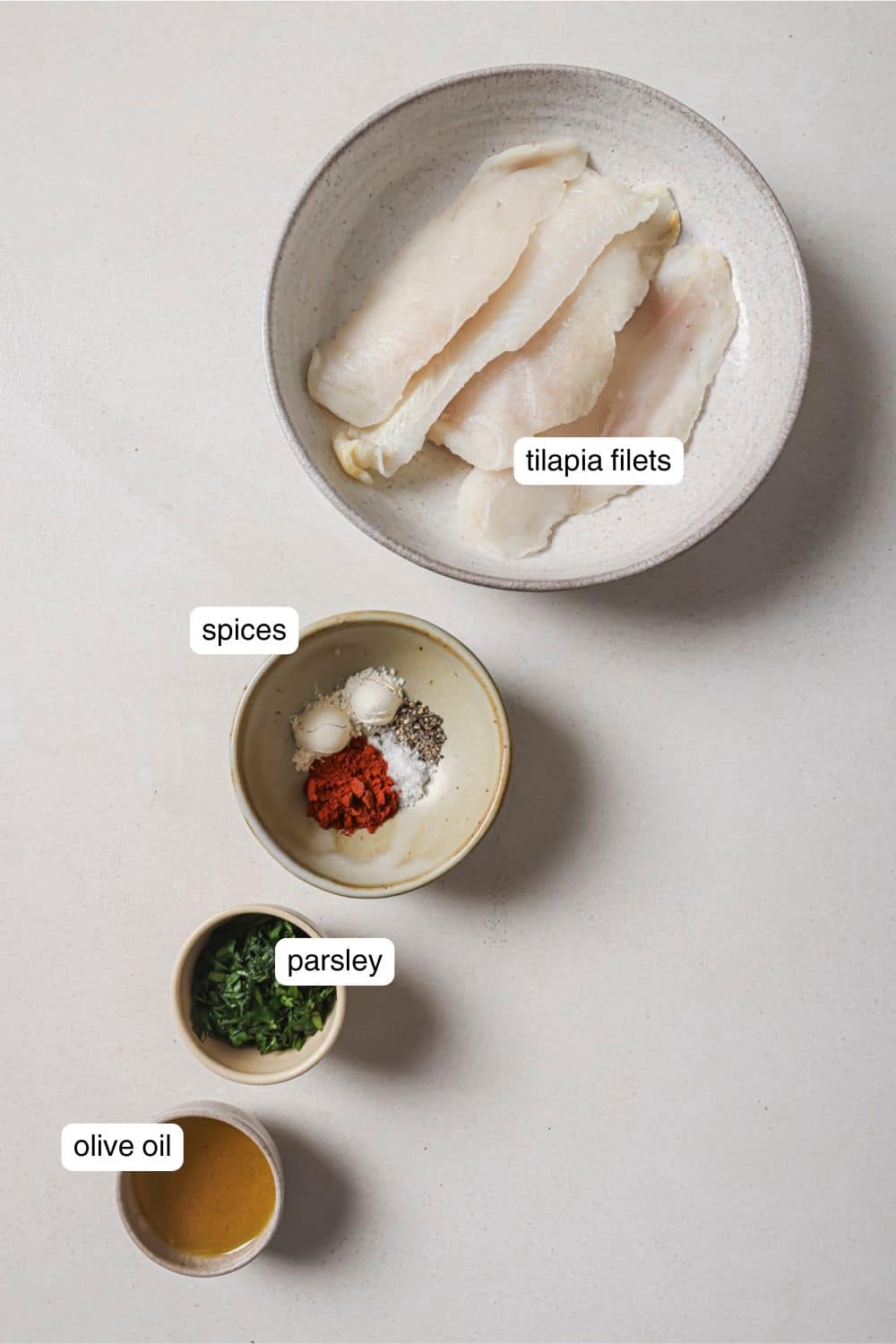 Labeled ingredients for air fryer tilapia.