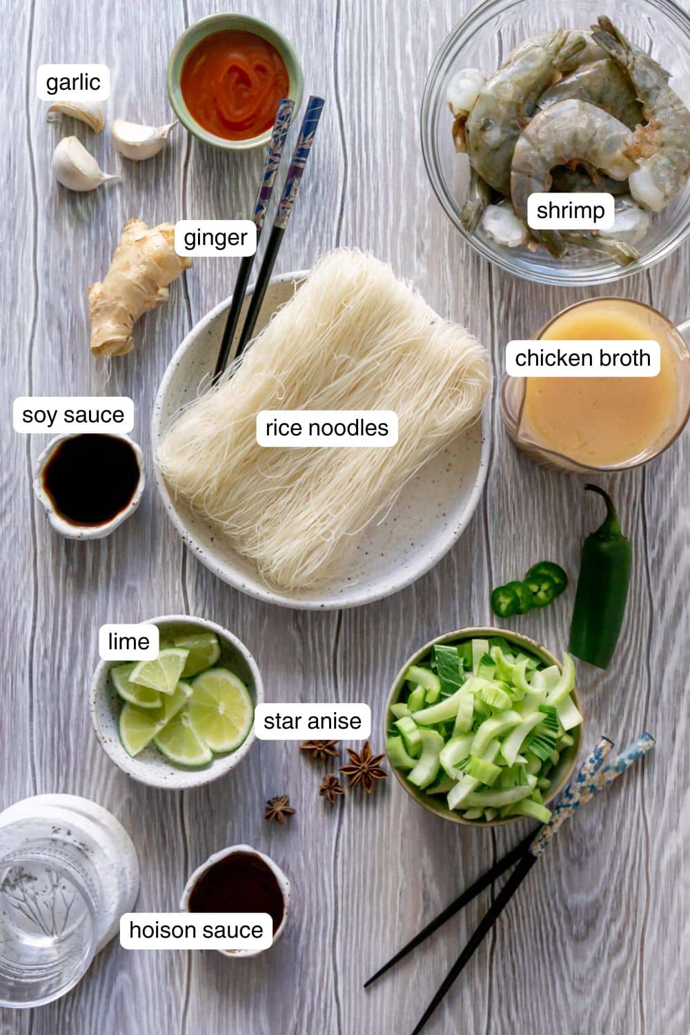 Labeled ingredients for shrimp pho soup.