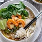 Shrimp pho in a bowl.