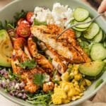 A bowl of tajin grilled chicken salad.