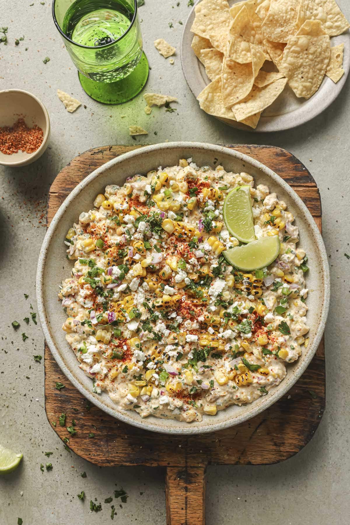 Street corn dip served with tortilla chips.