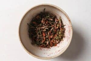 Combining herbs and spices for air fryer brisket.