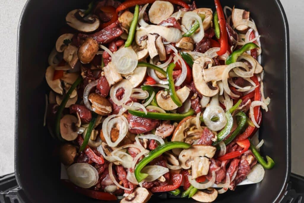 Veggies and steak in the air fryer.