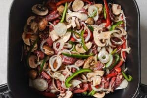 Veggies and steak in the air fryer.