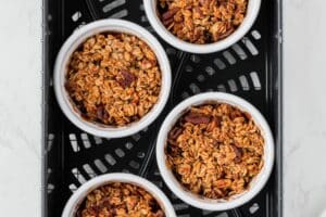 Air frying ramekins of apple crisp.