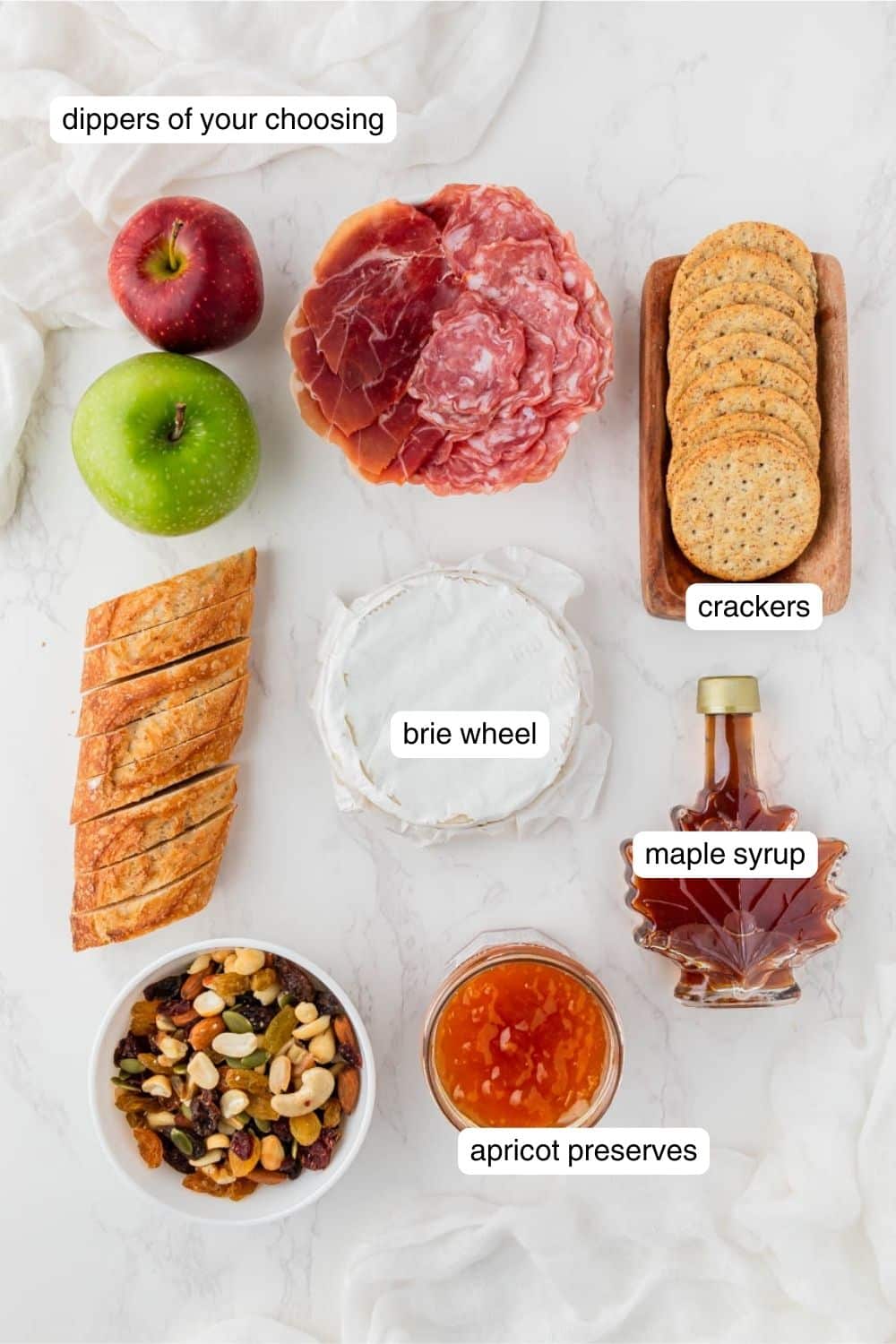 Labeled ingredients for air fryer baked brie.