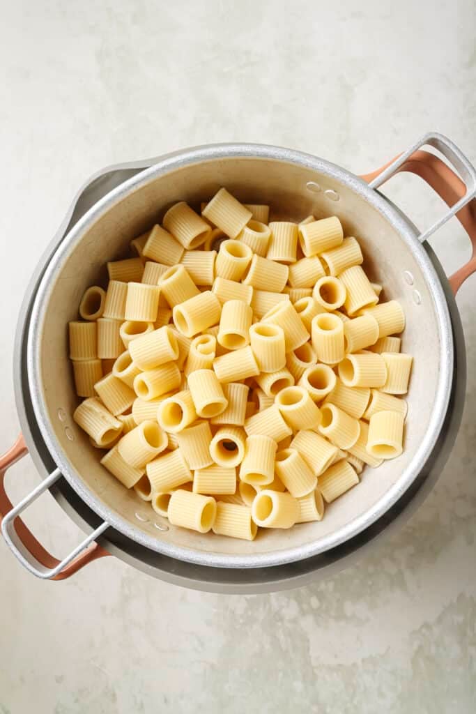 Draining pasta in a colander.